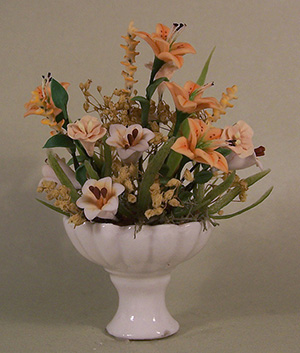 Yellow Lilies in a White Pedestal Vase